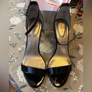 Bandolino Black Patent Heels. New condition in Box. Size 10 Medium.